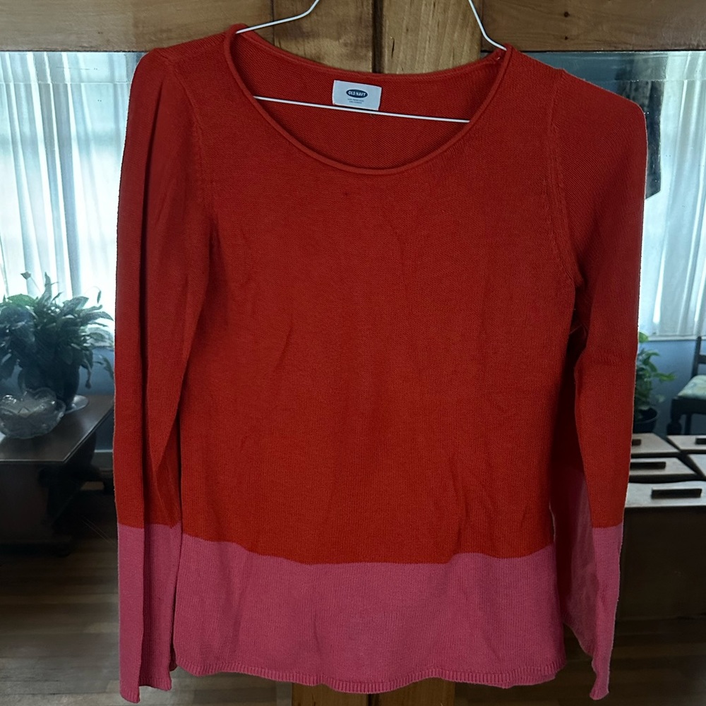 Old Navy orange and pink color block sweater. Long sleeved. Size small.